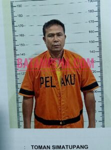 Tersangka Toman Simatupang.  (Sumber foto: JP – Batampena.com)
