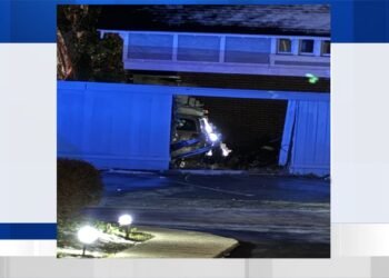 Car Hits Building, One Hospitalized