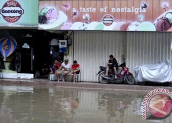 Banjir Jalan Pahlawan Banjarmasin: Aktivitas & Bisnis Terganggu
