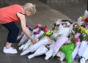 Grief and Fear: Locals Mourn Slain Good Samaritan