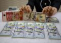 Rupiah melemah, tembus Rp17.184 per dolar AS hari ini