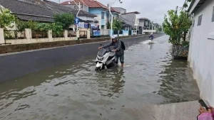 Banjir-Taman-Duta-Depok.jpg