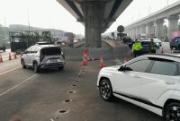 Arus ke Cikampek Padat, Contraflow KM 21-23 di Tol Jakarta-Cikampek Dibuka Lagi
